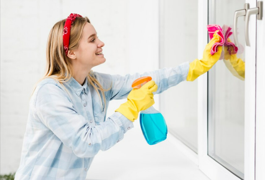 Free Photo Free photo side view woman cleaning windows
